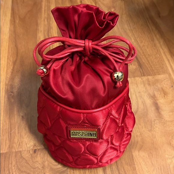 Moschino Handbags - NWOT Authentic Moschino Red Heart Quilted Drawstring Bag